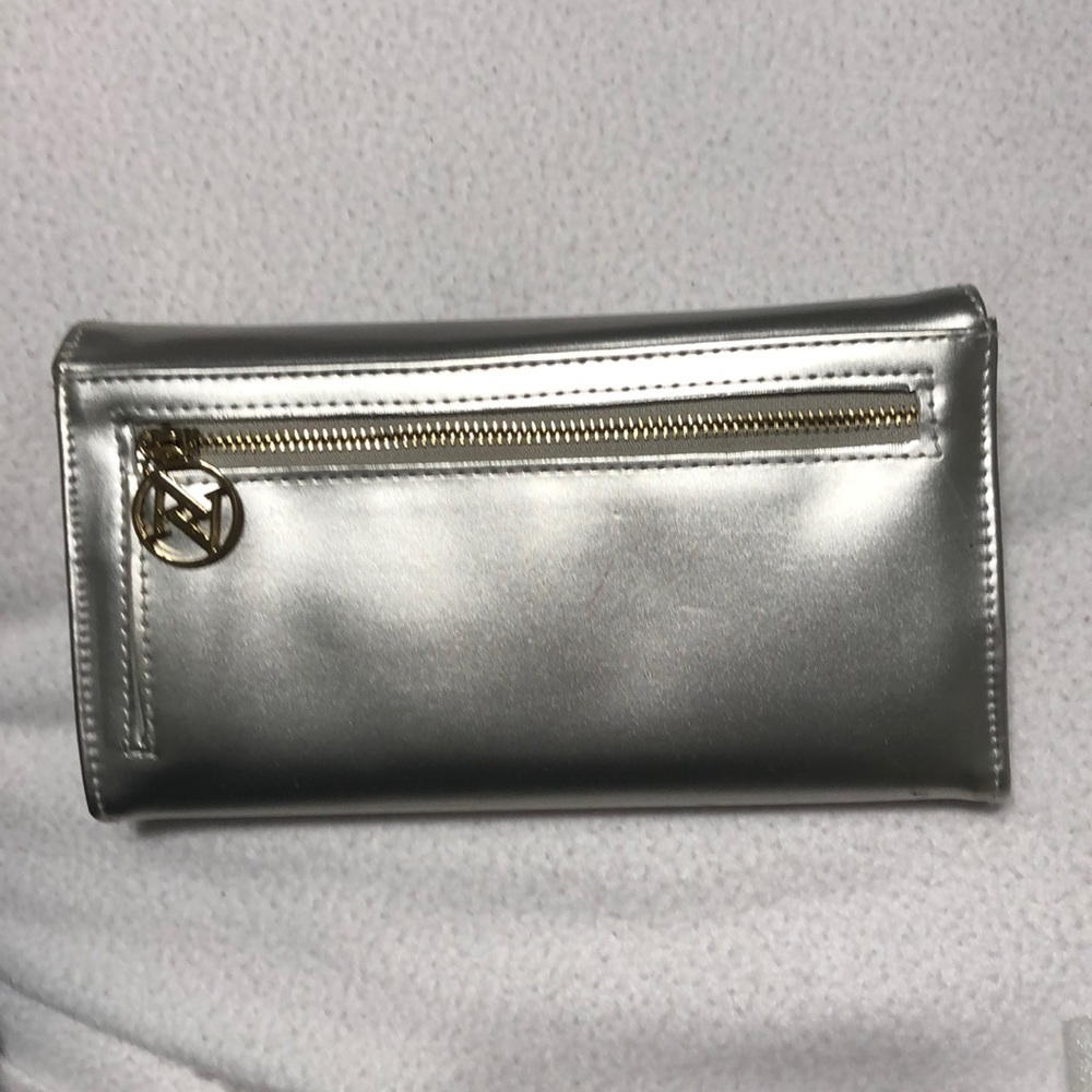 FREE W/30. PURCHASE ADRIENNE VITTADINI WALLET - Picture 8 of 8